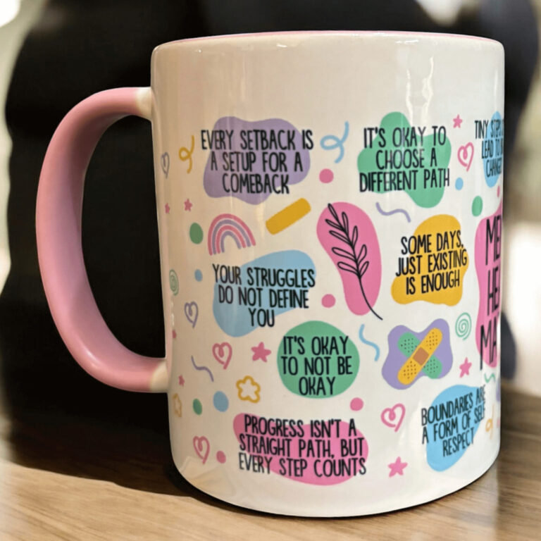 2 tone pink mug with mental health matters imagery close up view