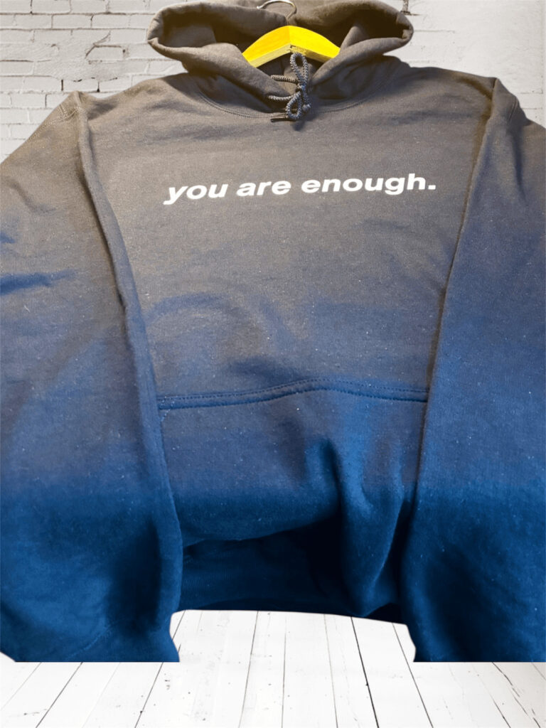 Blue hoodie with You Are Enough in white text