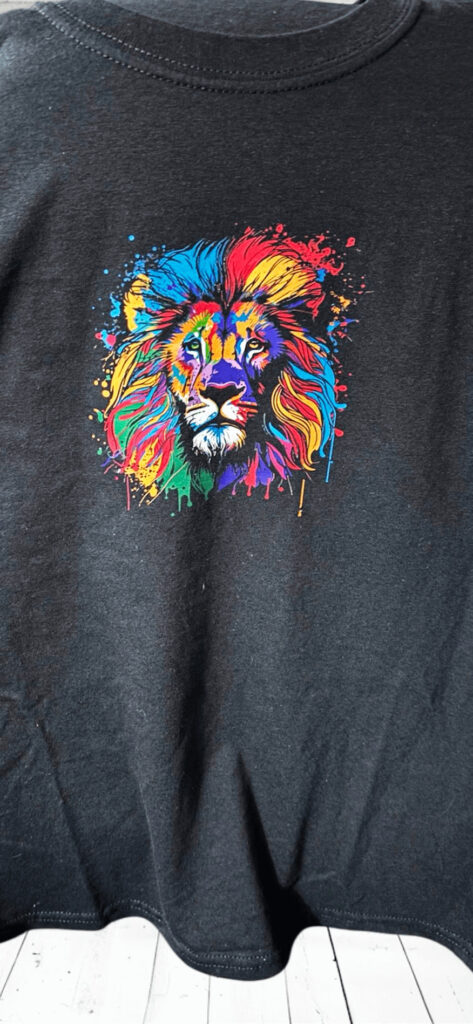 DTF pressed t shirt with colourful lion image applied